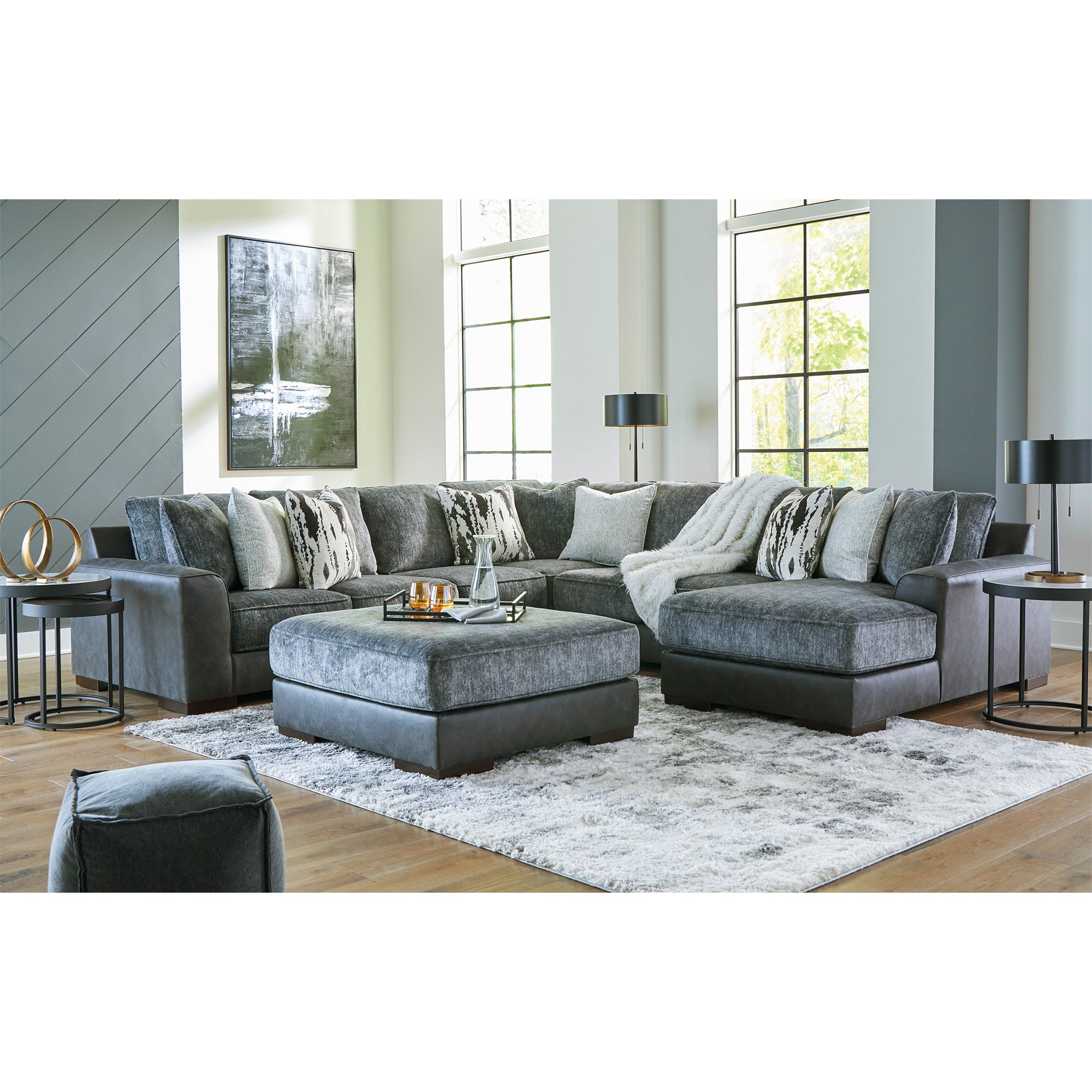 Larkstone 4-Piece Sectional with Chaise in Pewter Color