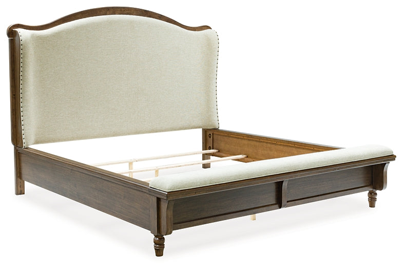 Sturlayne California King Upholstered Panel Bed with Mirrored Dresser and Nightstand