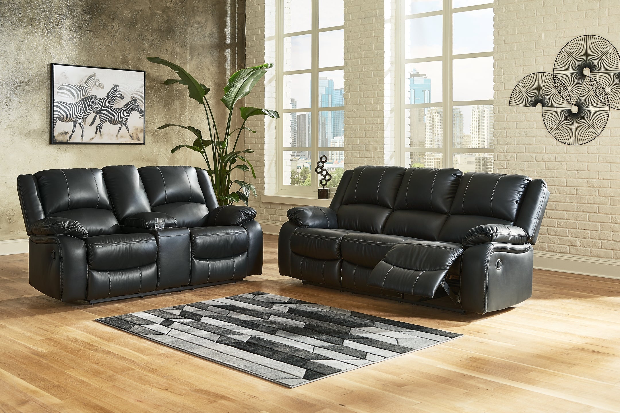 Calderwell Manual Reclining Sofa and Loveseat